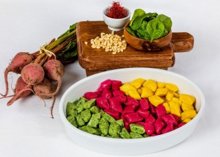 Caterer's tricolor gnocchi with beets, pesto and saffron