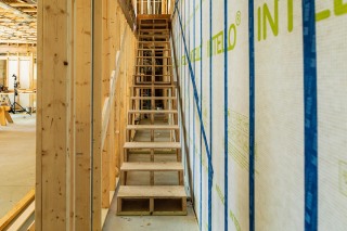 Stairs in house under construction at location shoot