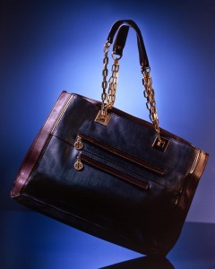 Suspended luxury handbag at product shoot