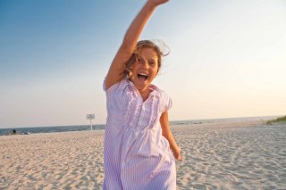 Girl running on beach